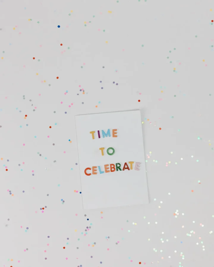 Printed party invitation card with confetti