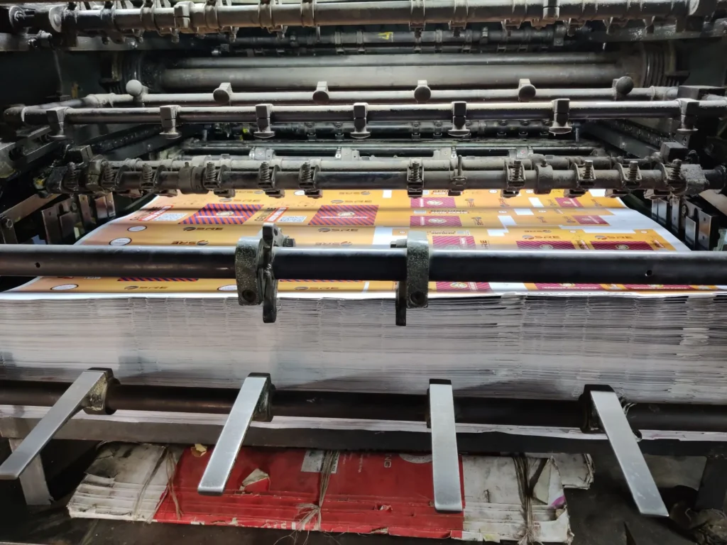 Freshly printed sheets on an offset press