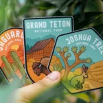 Hand holding die-cut illustrated stickers